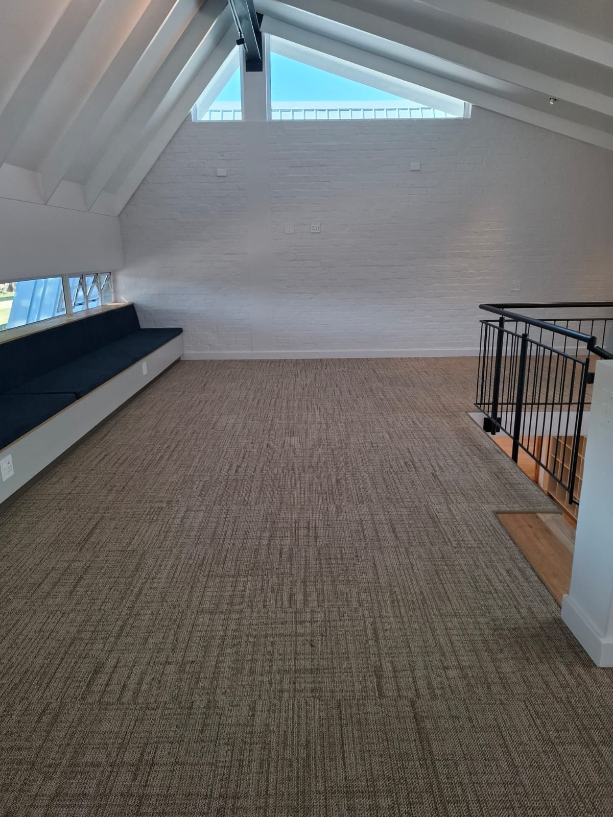 Floornet Blooms carpet tiles in Amarula in the light-filled loft space